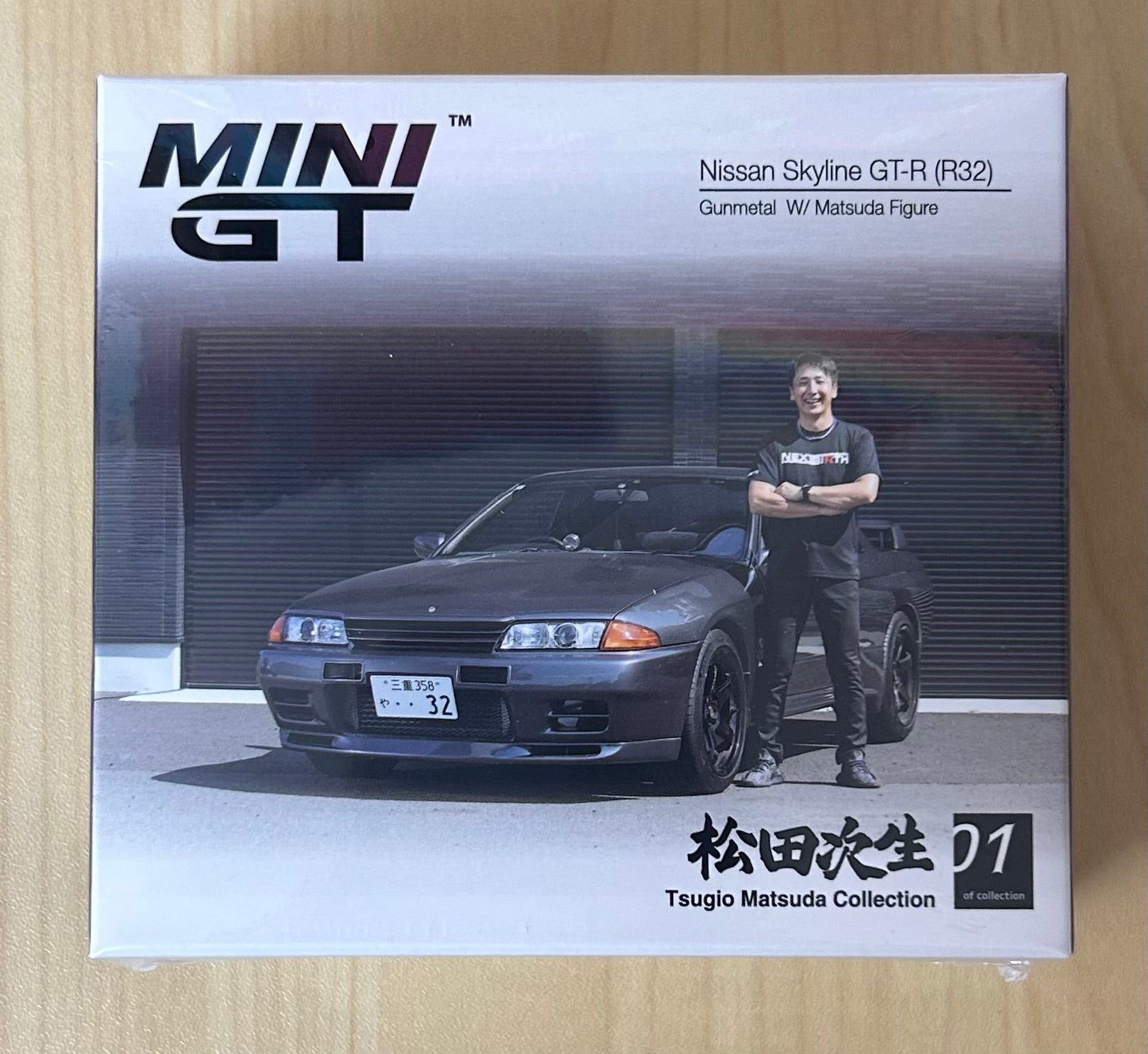 Mini GT Nissan Skyline GT-R (R32) Gunmetal w/ Tsugio Matsuda Figure #869